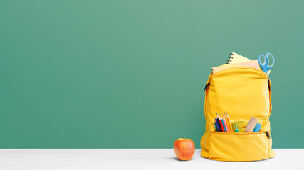 Yellow Backpack with apple